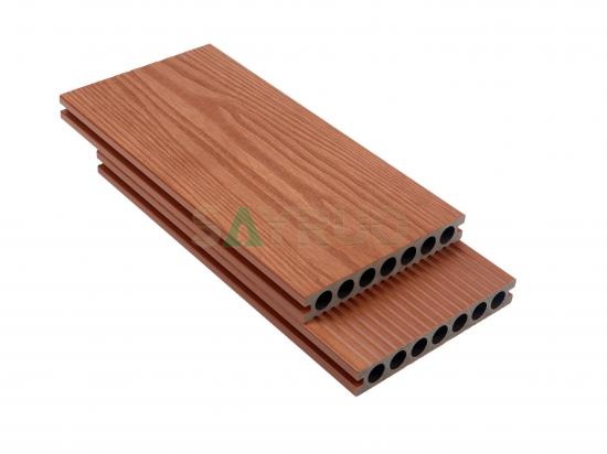 Co-extrusion embossed woodgrain composite decking