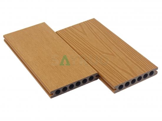 Co-extrusion embossed woodgrain composite decking